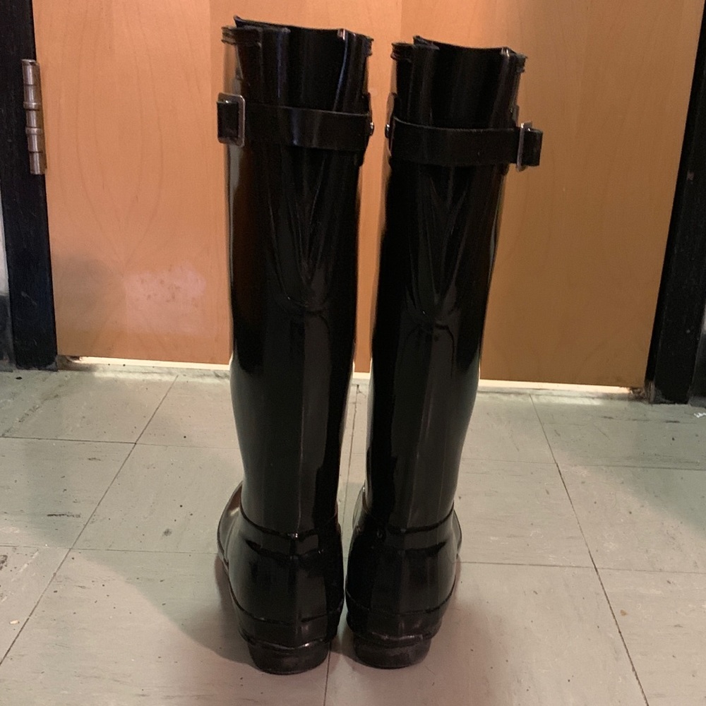 Glossy black adjustable tall hunter boots
